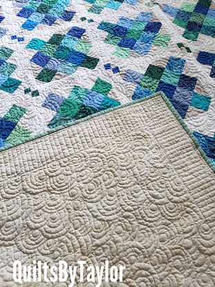 Quilts For Sale Jelly Bean Quilt styled on bed, modern throw blanket 65x63